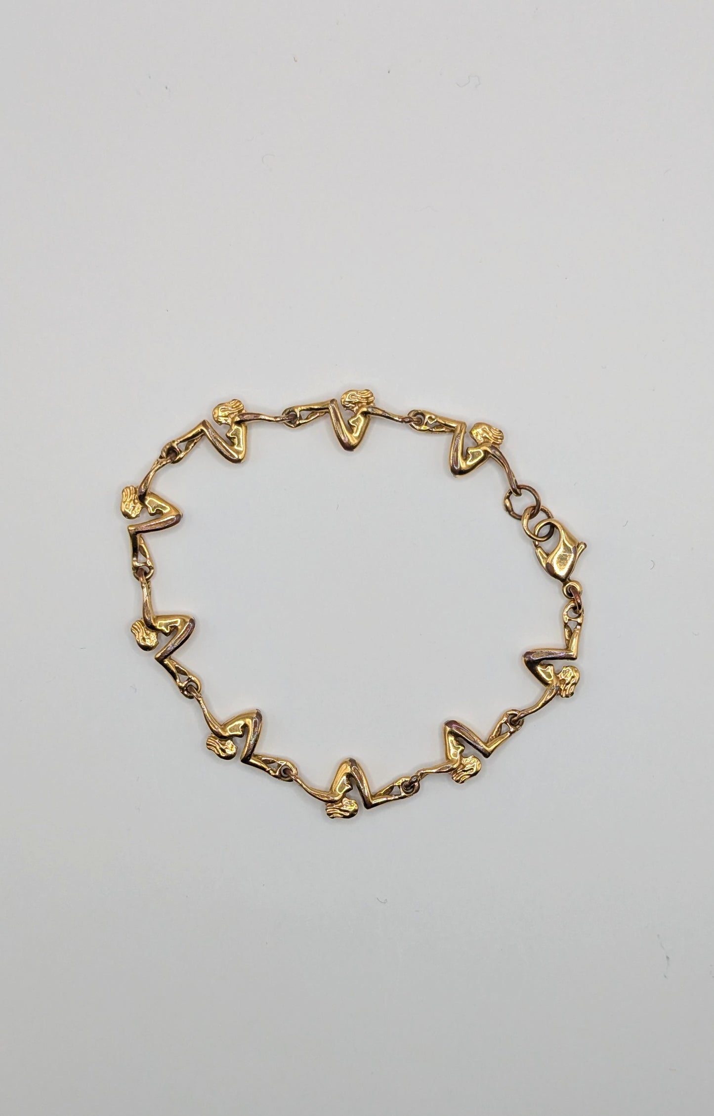 Vintage 1980 Charles Jourdan acrobatic women gold plated bracelet