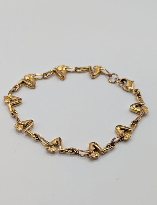 Vintage 1980 Charles Jourdan acrobatic women gold plated bracelet